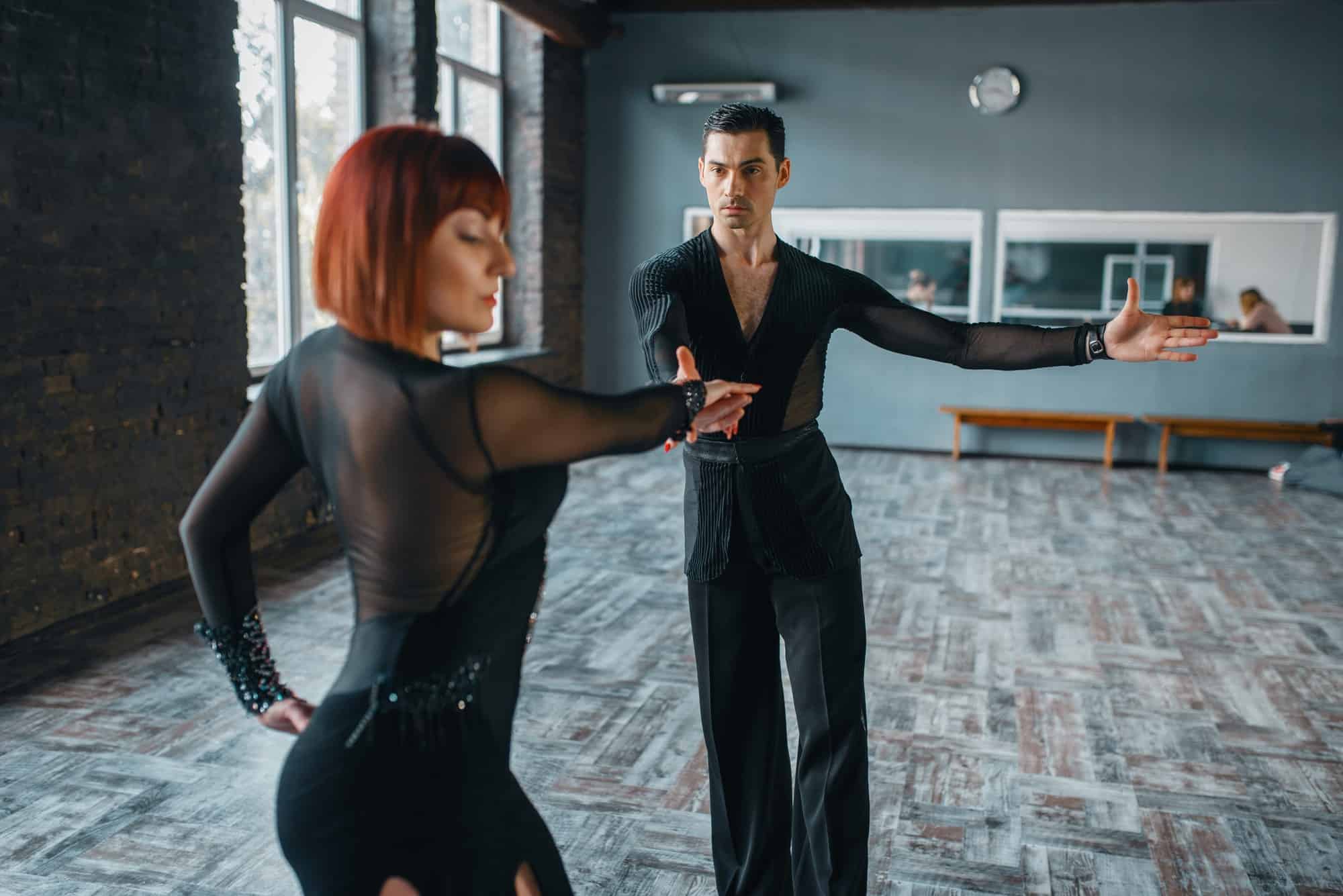 Dancers in costumes on ballrom dance training